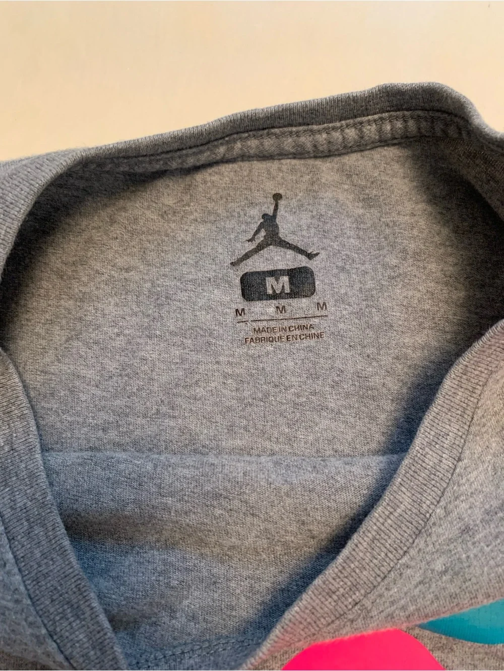 Jordan Men’s Gray Tee with Hot Pink Jumpman Graphic, Size Medium